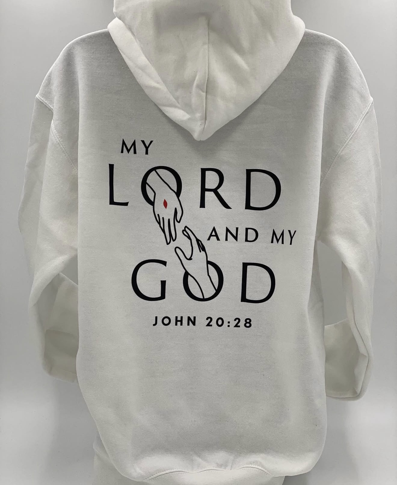 White hoodie with My Lord and My God artwork and John 20:28 text printed on the back
